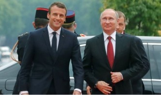 Путин пригласил Макрона посетить Россию